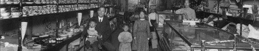 1907 photo of family posing in Japan Bazaar at 1410 Hewitt